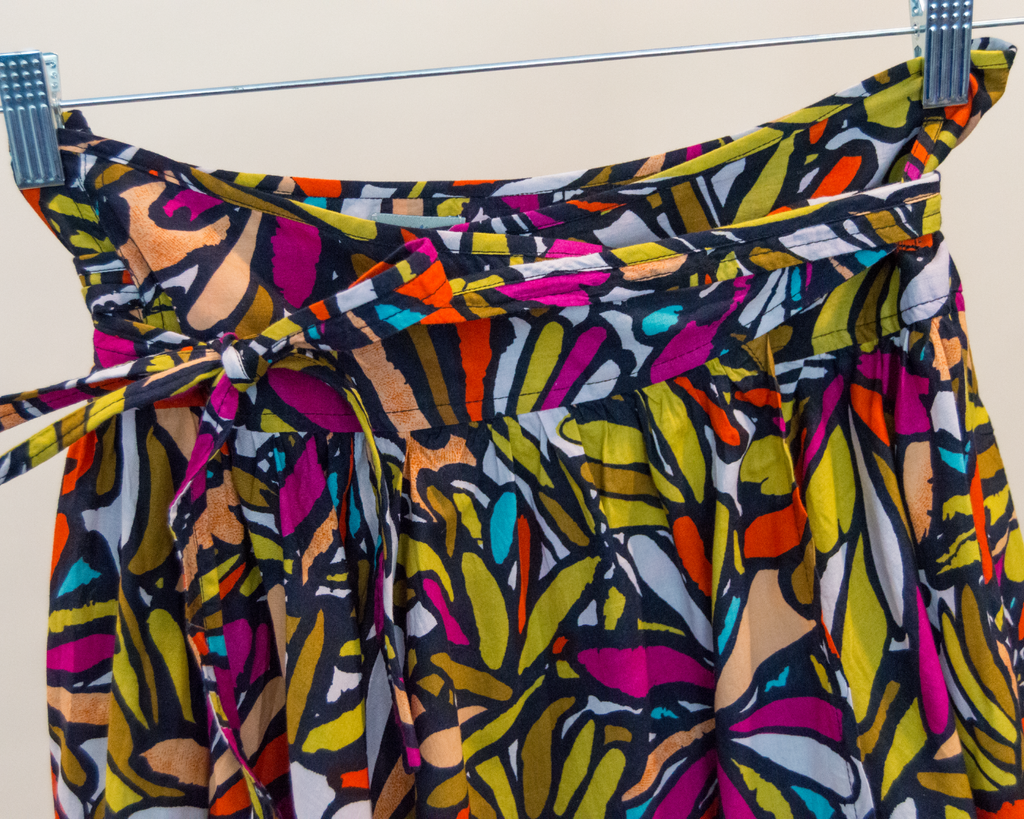 Colorful abstract patterned fabric on a white background