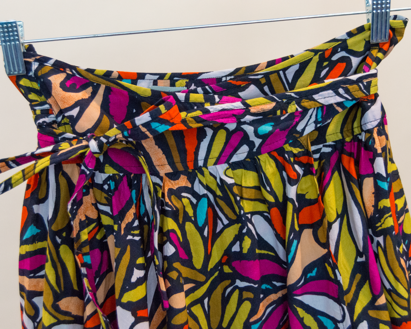 Colorful abstract patterned fabric on a white background